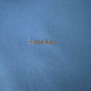 Calvin Klein liquid cotton polo shirt.  Hardly used.  Great shirt.